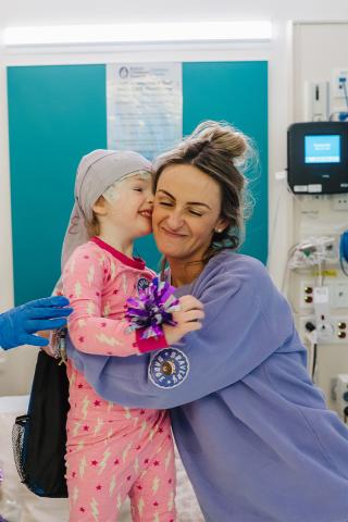 patient and her mom hugging